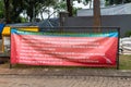 A banner or sign warning about the Covid-19 coronavirus pandemic in indonesia0